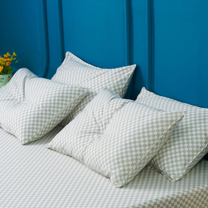 pillowcases sitting on a bed